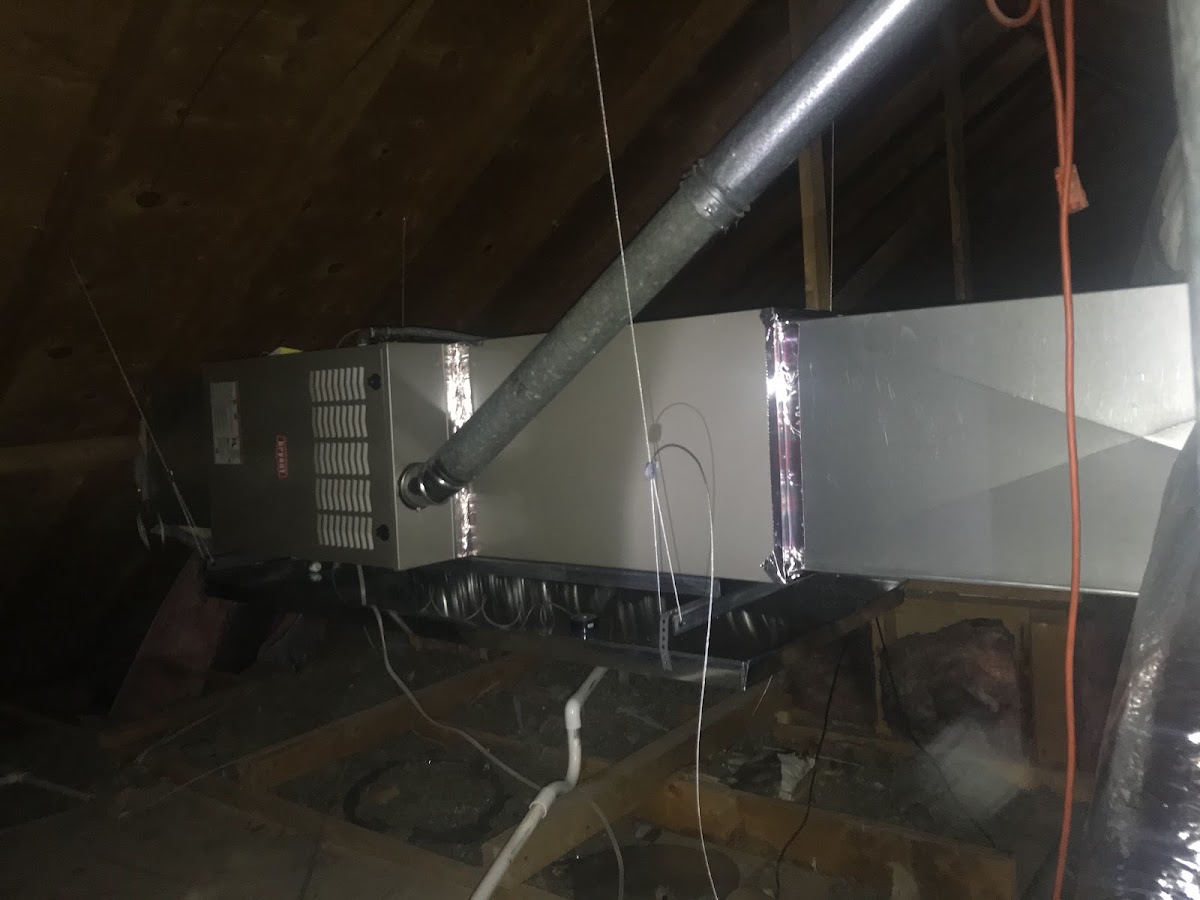 Attic HVAC unit with UV light